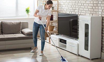 Cleaner Mopping Livingroom Floor